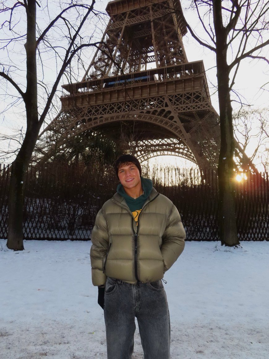In front of the Eiffel Tower in the snow