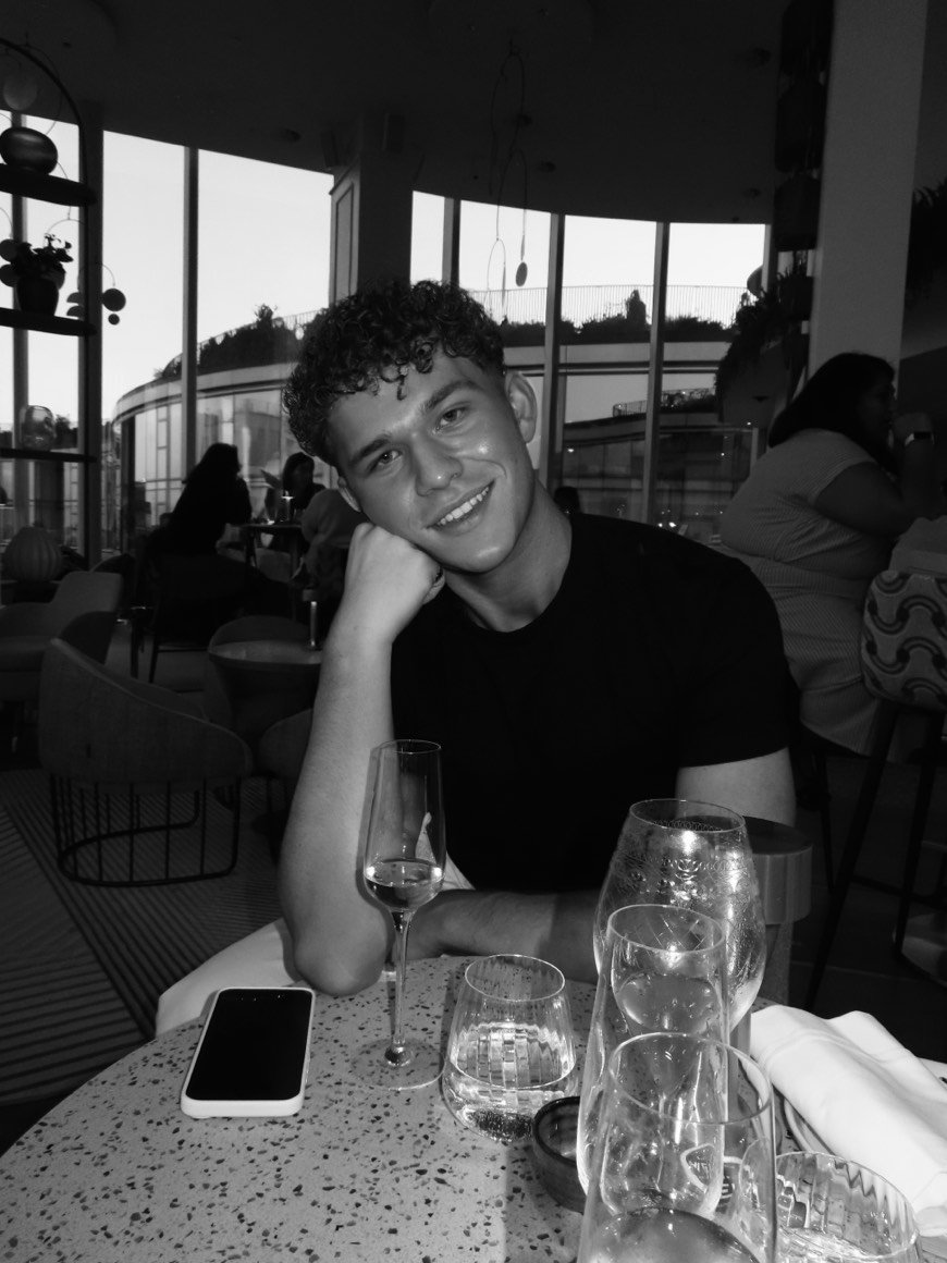 Black and white, at a restaurant table